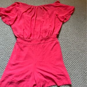 White House Black Market never been worn, with tags, brand new woman’s romper!